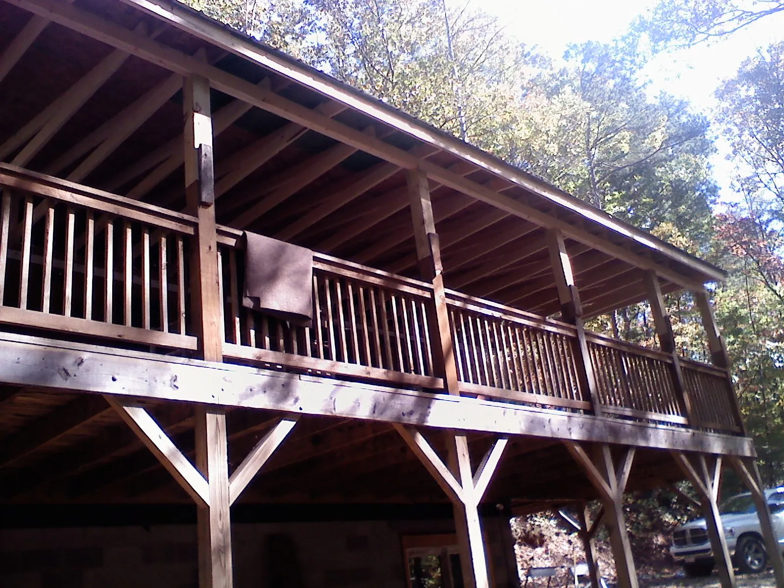 Timber framing under a new elevated porch and deck — Roof Leak Repair in Woodward by Roofing Brothers